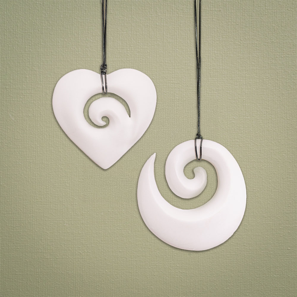 Handcrafted hanging koru ornaments